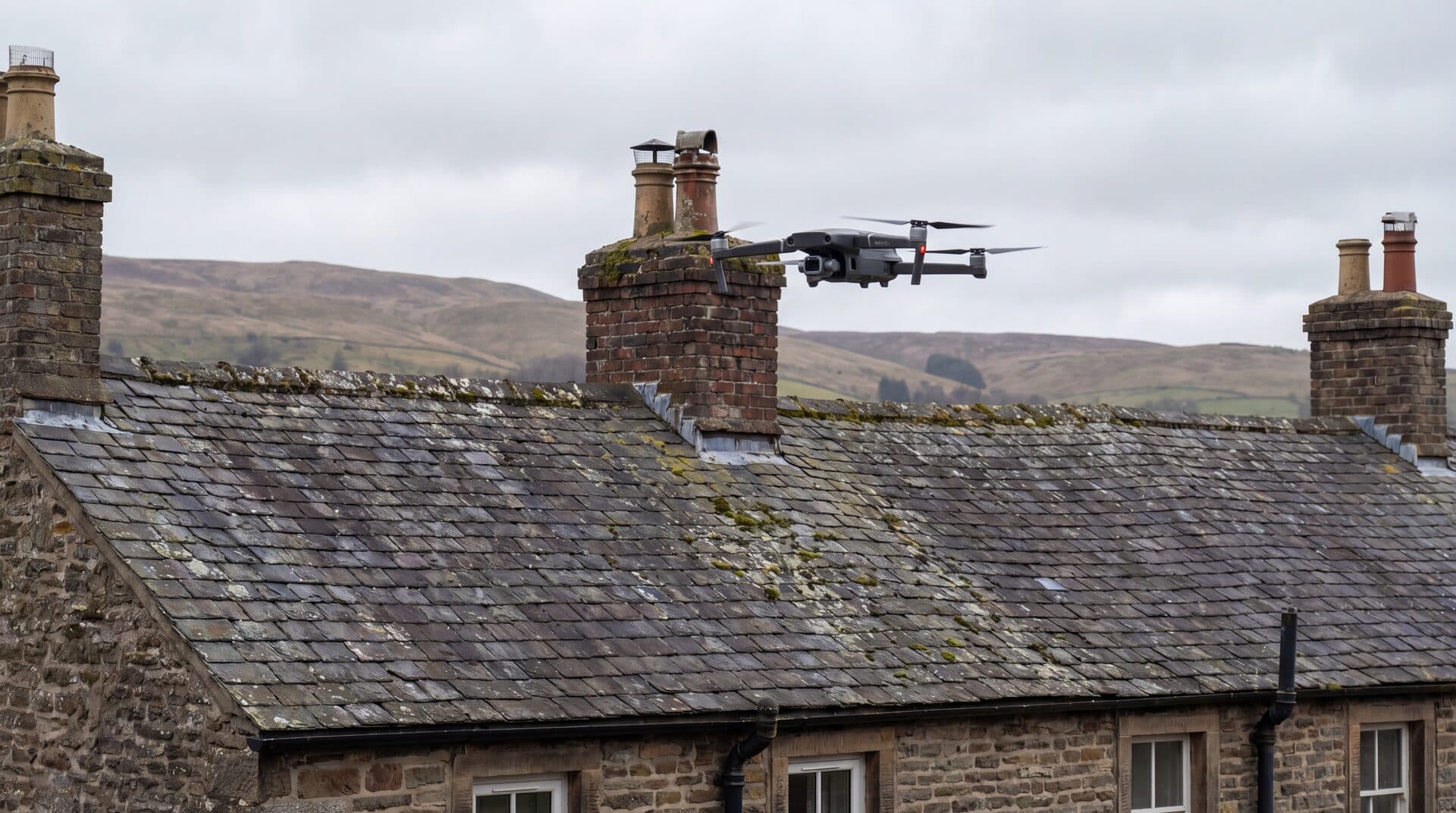 Drone performing a roof inspection in Exeter